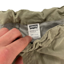 Load image into Gallery viewer, 2000s Levi’s Silvertab Data Convertible cargo bottoms
