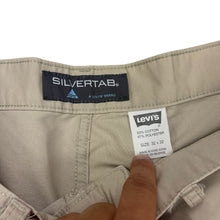 Load image into Gallery viewer, 2000s Levi’s Silvertab cargo bottoms
